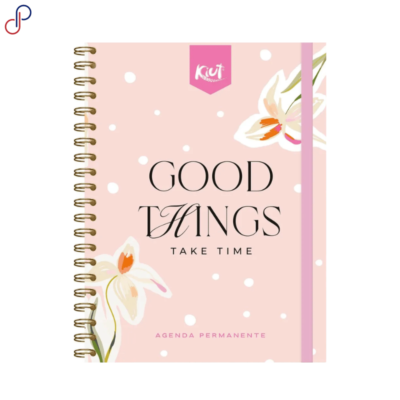 Agenda Kiut permanente de un color rosa, con una flor y una frase en medio que dice: "good things take time"
